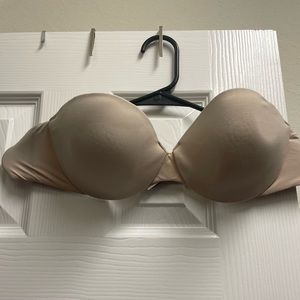 Strapless Nude/Cream Victoria’s Secret 36B bra.